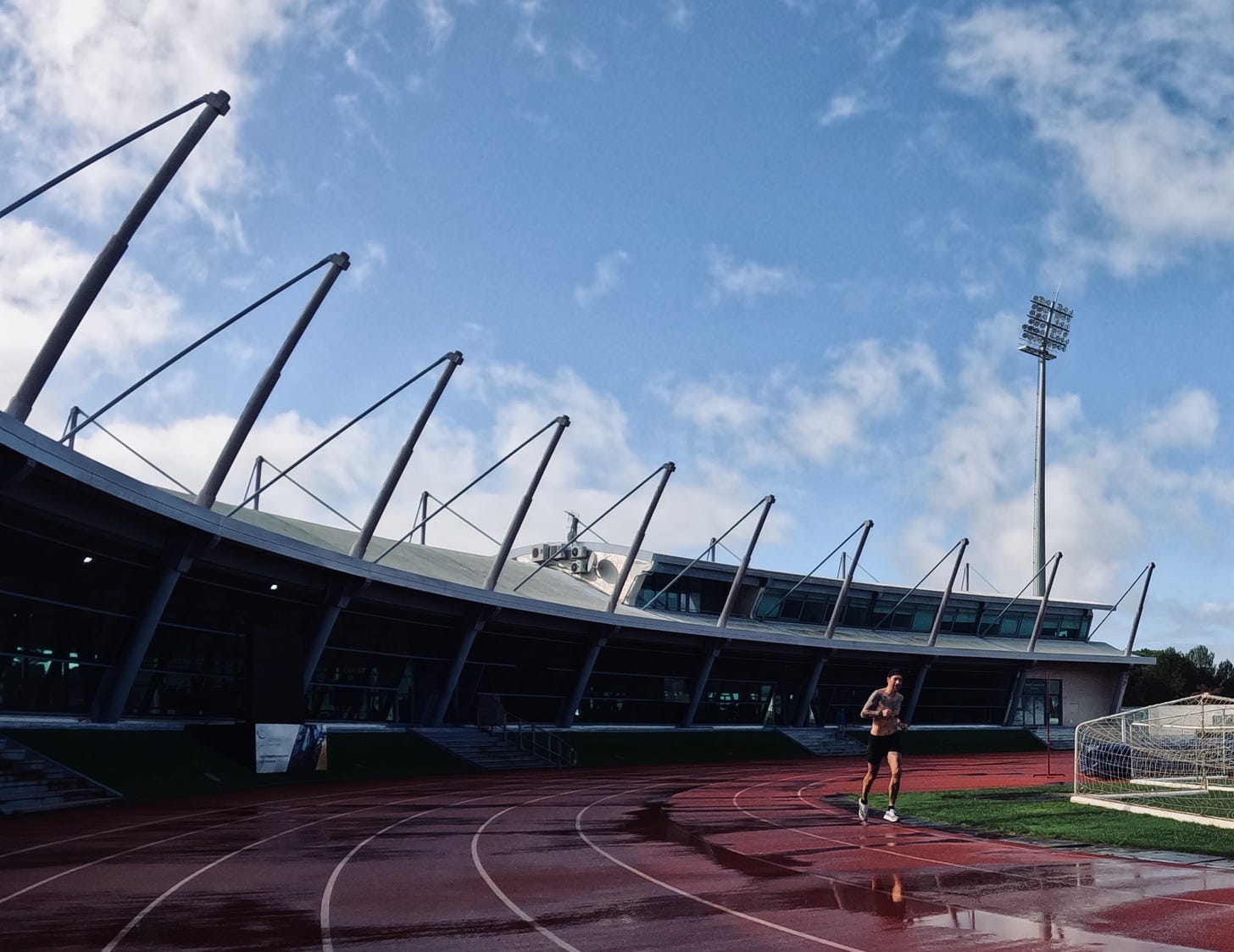 The author running on a track in a stadium