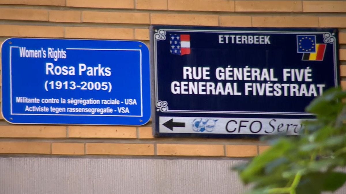 Picture of two street plaques in Belgium, one named after a colonial leader, and a new one celebrating Rosa Parks