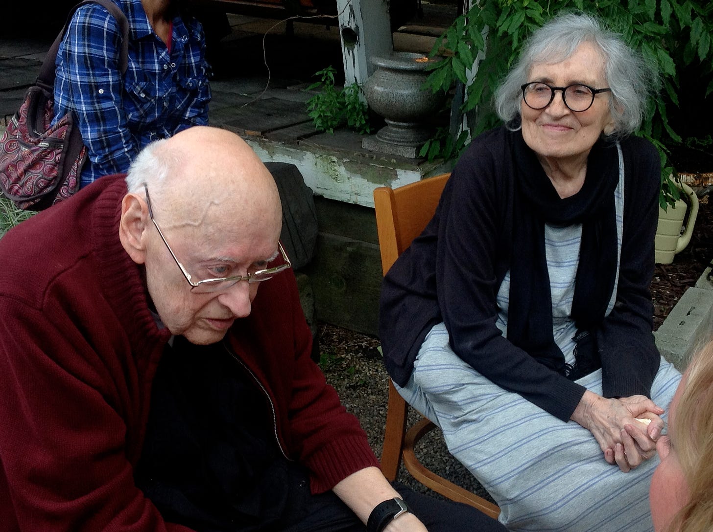 Frank and Bunny again, sitting in a garden. Bunny is smiling at Frank, whose hunched-over posture hints at the Alzheimer's he was then suffering from.