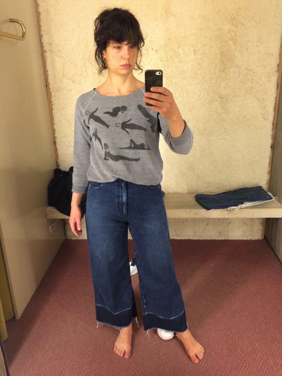 Me trying on the Legion Jeans at Comey's SoHo store circa 2015. The textured wall and concrete bench elevates the retail experience. 