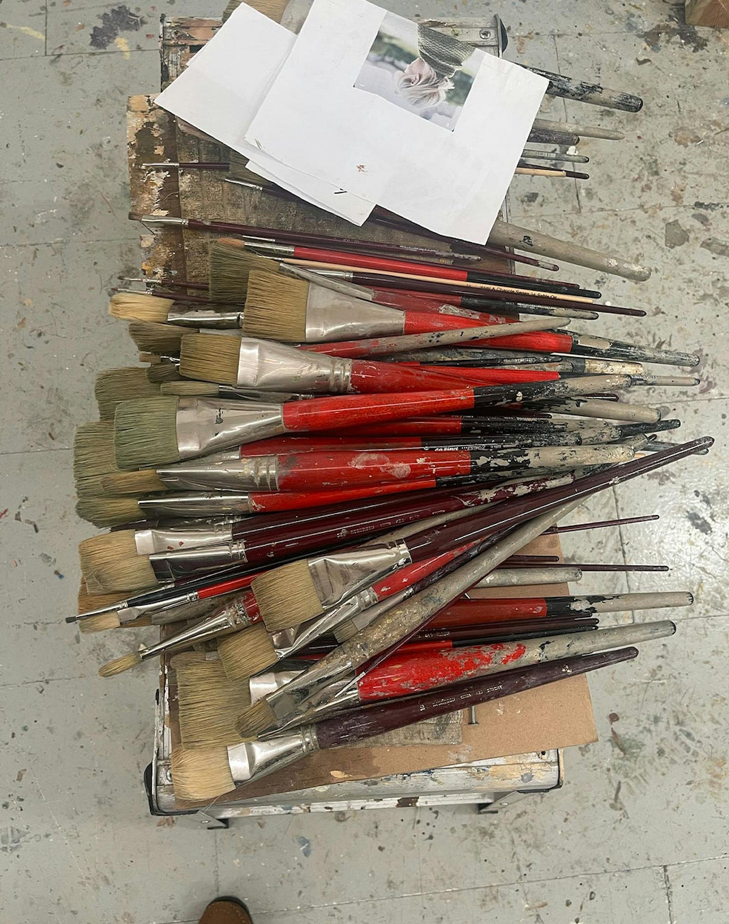Gideon Rubin paint brushes at his studio