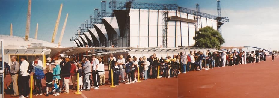 A photo of people in line at the Millennium Dome waiting to enter the event
