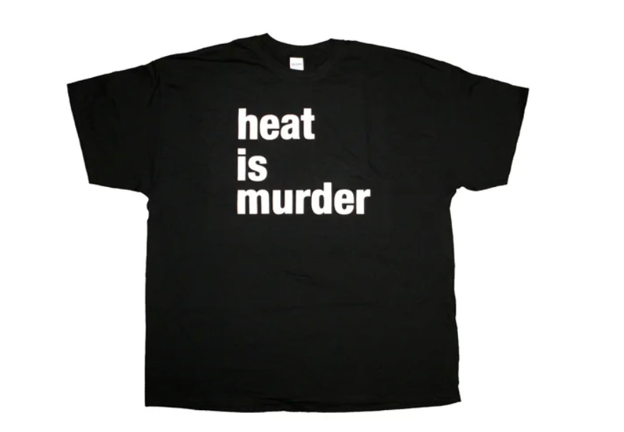 a black shirt with white text "heat is murder"