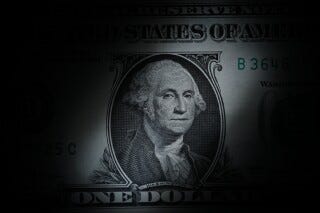 The likeness of George Washington is seen on a U.S. one dollar bill, March 13, 2023, in Marple Township, Pa. (AP Photo/Matt Slocum, File)