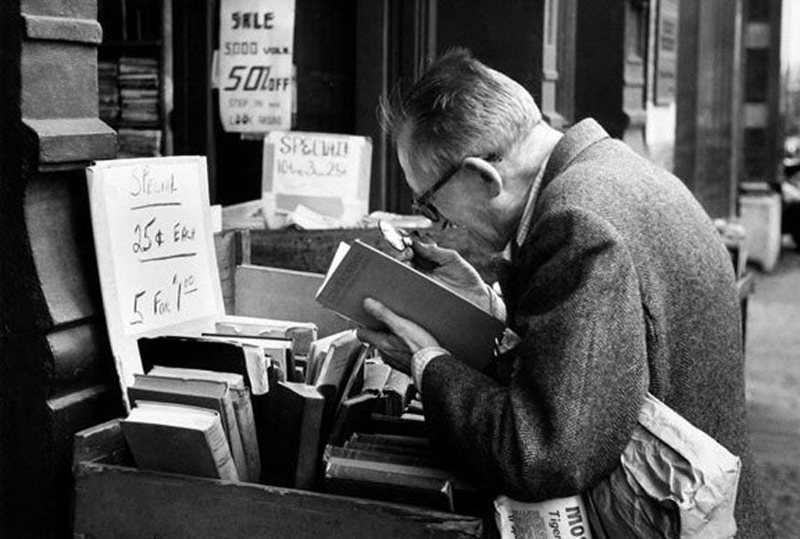 Man Reading with Magnifying Glass, New York, 1959. André Kertész/Stephen Bulger gallery