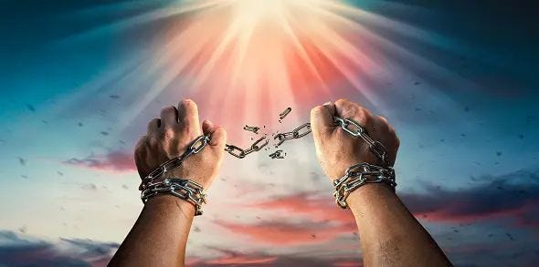 hands in fists breaking a chain freedom the concept of gaining freedom