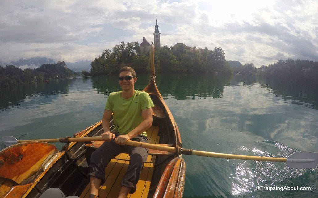 Embracing the tourist life to row a swan boat out to the romantic castle in the center of Lake Bled.