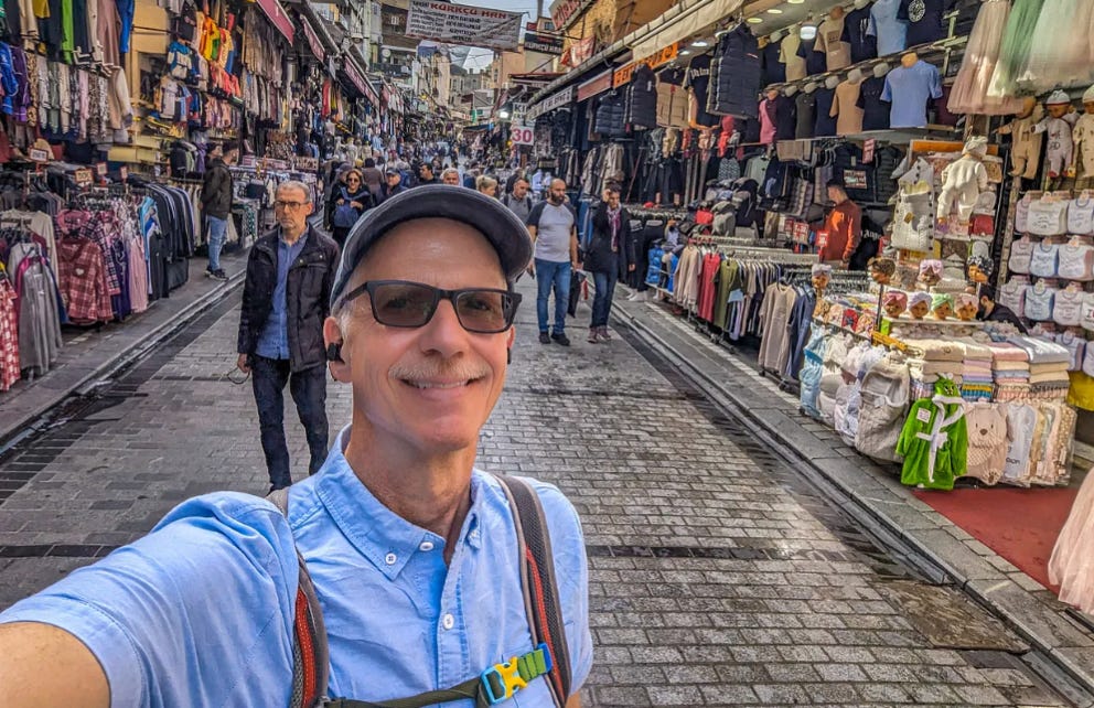 Michael standing on a narrow street market in Istanbul, Turkey. 