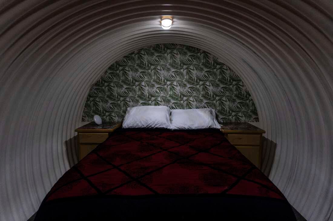 A bedroom is shown inside an underground shelter in an undisclosed Southern California city, Monday, Dec. 16, 2024.