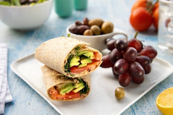 Olive hummus wraps plated