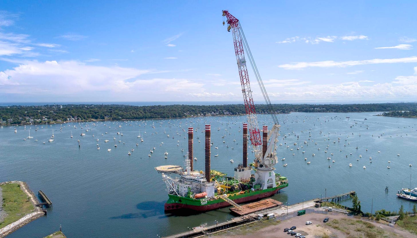 The &quot;Sea Installer&quot; stopped in Salem Harbor before heading out to the ocean near Martha's Vineyard, where it will install 62 massive wind turbines for Vineyard Wind. (Robin Lubbock/WBUR)