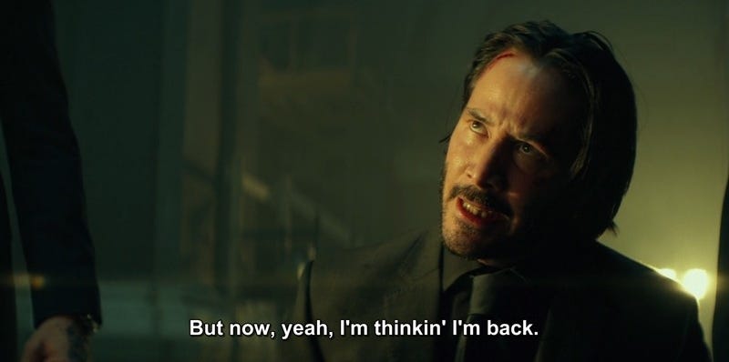 An image still of John Wick saying, "But now yeah I'm thinking I'm back."