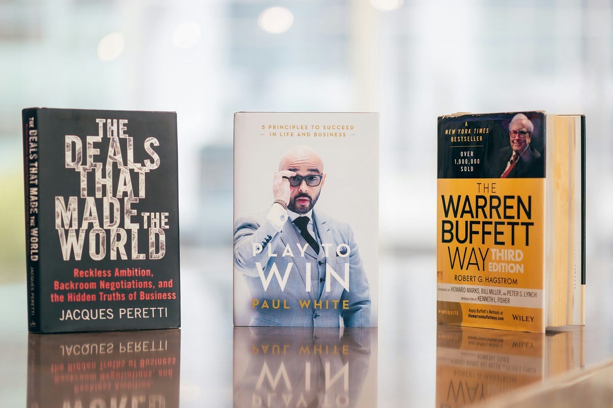 three books on a table three books on a table