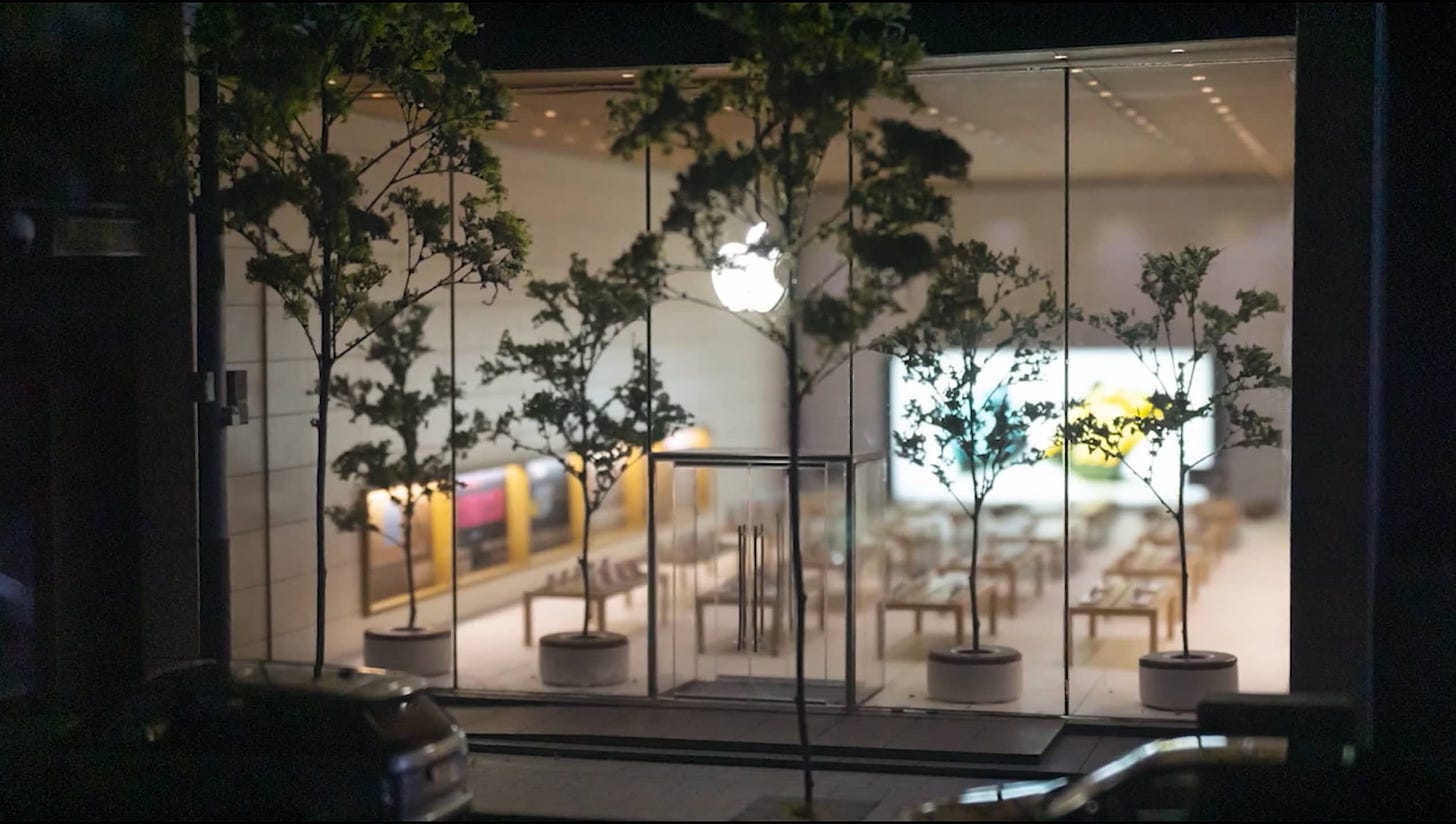 The exterior of the Apple Garosugil diorama with nighttime lighting.