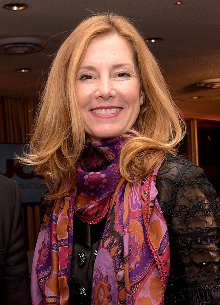 A headshot of investigative journalist and author Conchita Sarnoff