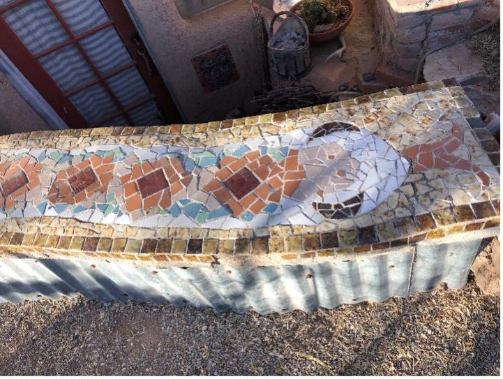 Rattlesnake mosaic bench