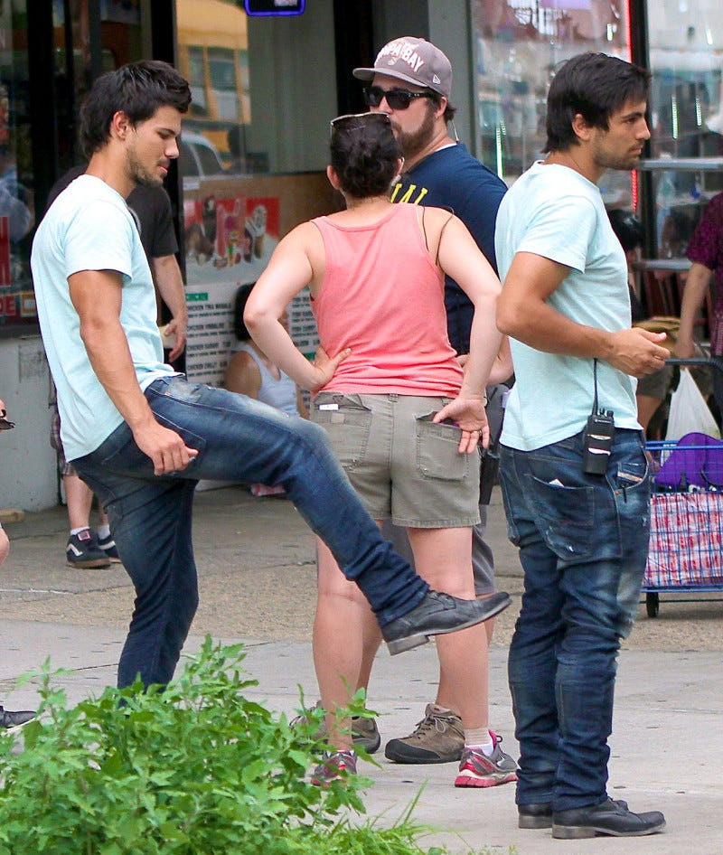 taylor lautner kicks up bulge for tracers stunt double