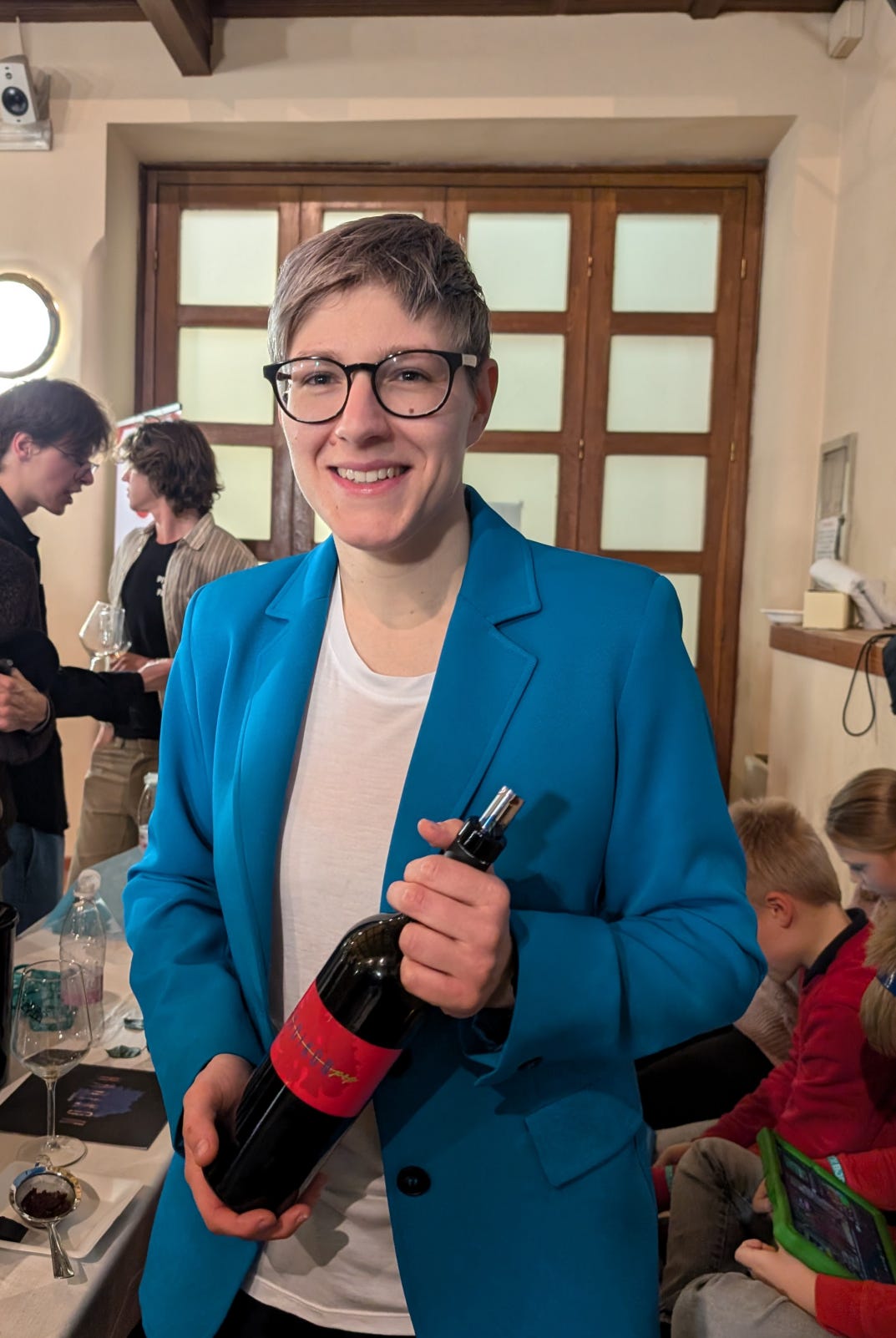 Ivana Radikon with a bottle of Pop Rosso