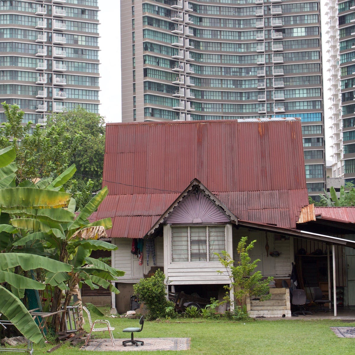 A village amid skyscrapers: how long can Kuala Lumpur's enclave hold out? |  Cities | The Guardian