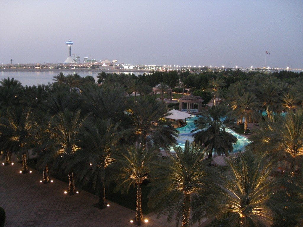 The view from our room over the East wing pool and Abu Dhabi