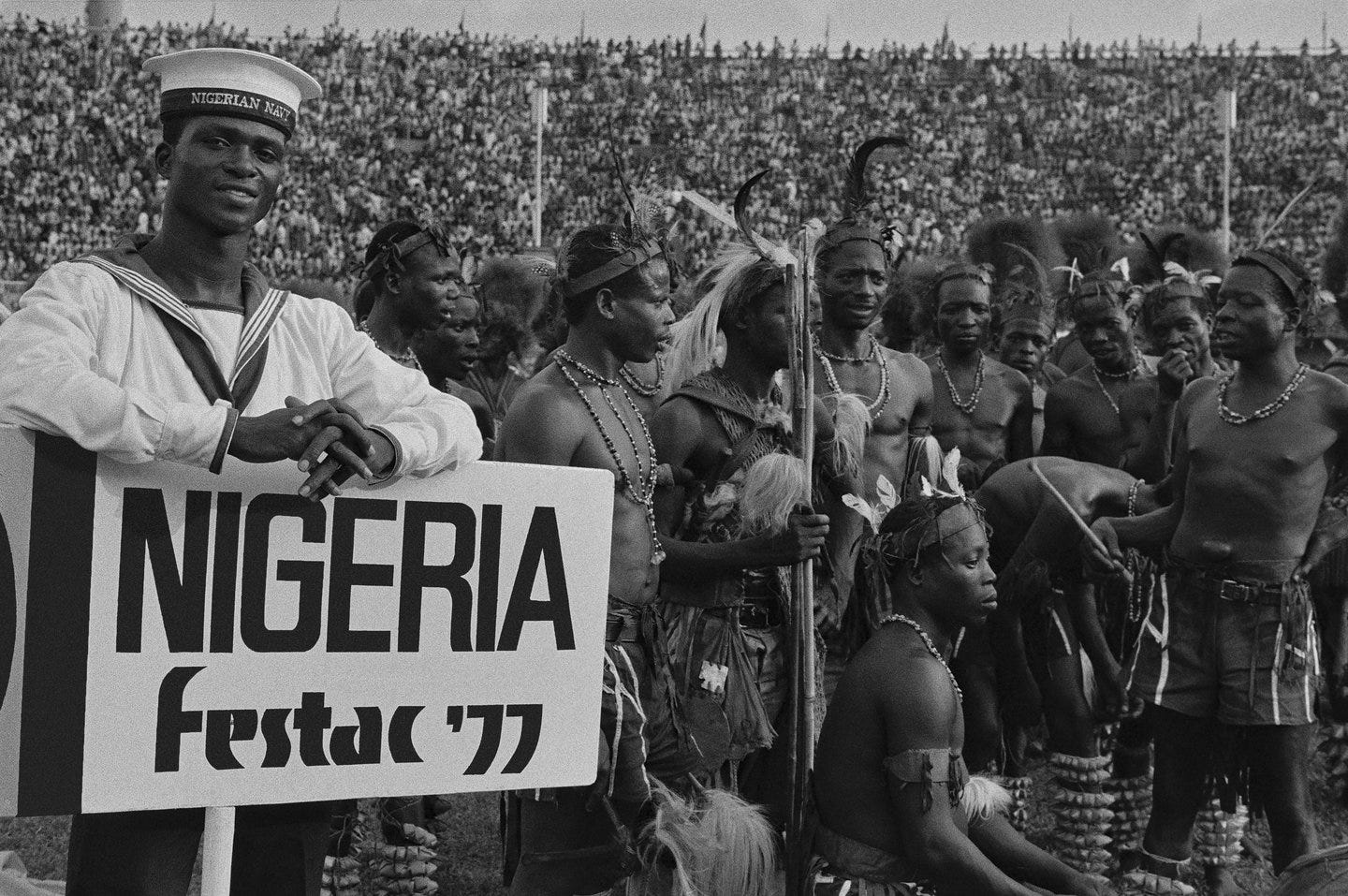 Black and white photo taken at Photo taken at FESTAC '77 showing thousands of celebratory Black people.