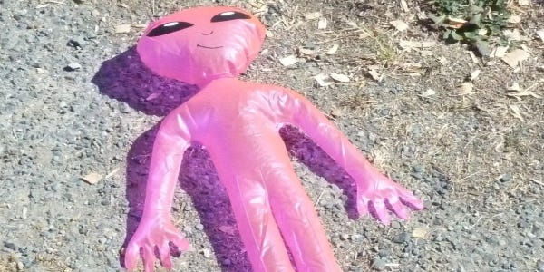 An inflated alien enjoying some sun