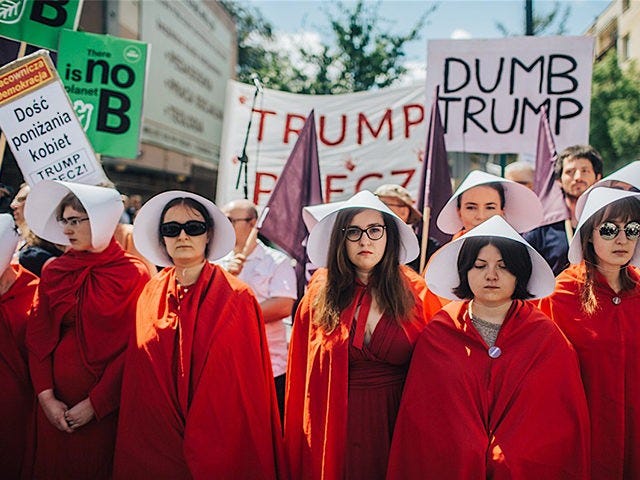 Women Stage 'Handmaid's Tale' Protest Against Trump in Poland