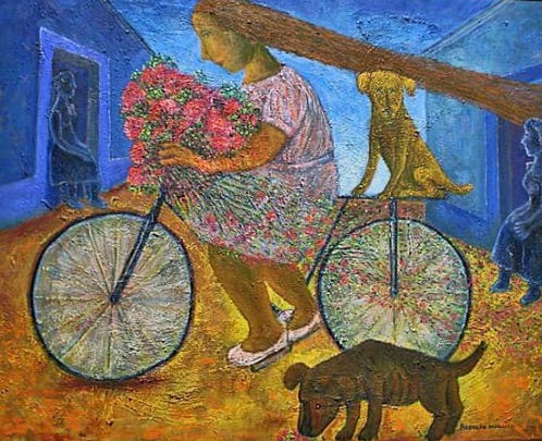 Cyclist with flowers and two dogs