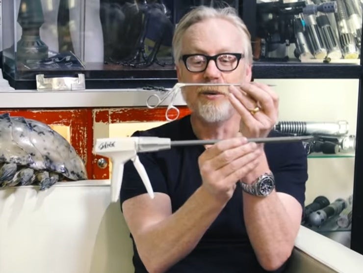 Adam shows off his long-shank surgical reacher tools