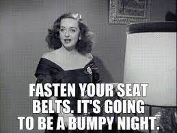 photo from the film "All About Eve" with Bette Davis saying "Fasten your seatbelts. It's going to be a bumpy night."