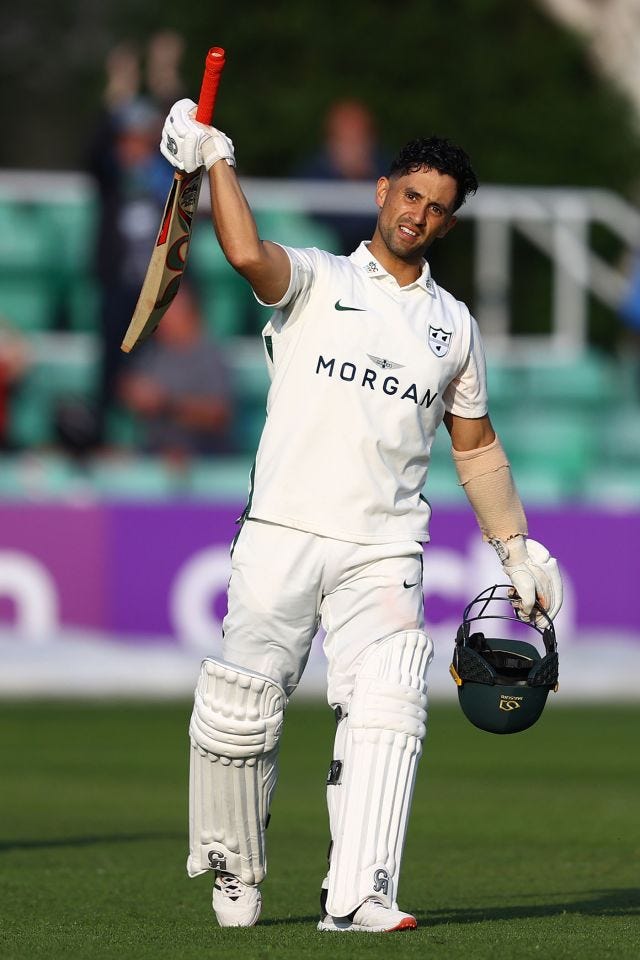 Brett D'Oliveira celebrates reaching his century