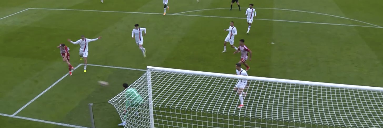 A screenshot showing Olympiacos scoring a goal against AC Milan in the UEFA Youth League final.