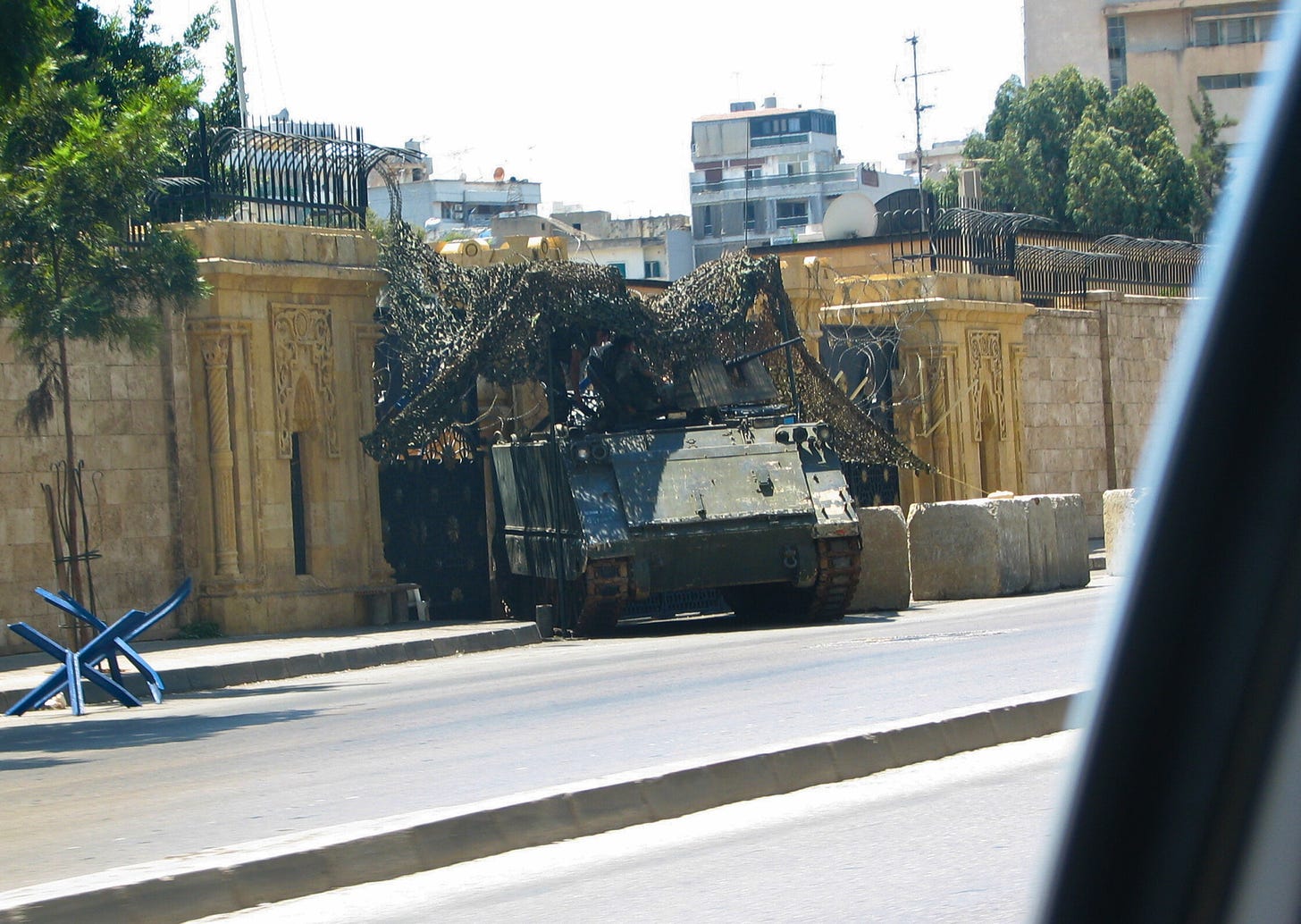 Camouflaged tank on the road in Beirut on way to Hamra during 2006 Lebanon War. Photo by Constantine Markides