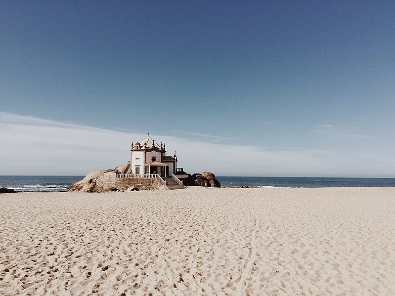 File:House on sand beach (Unsplash).jpg