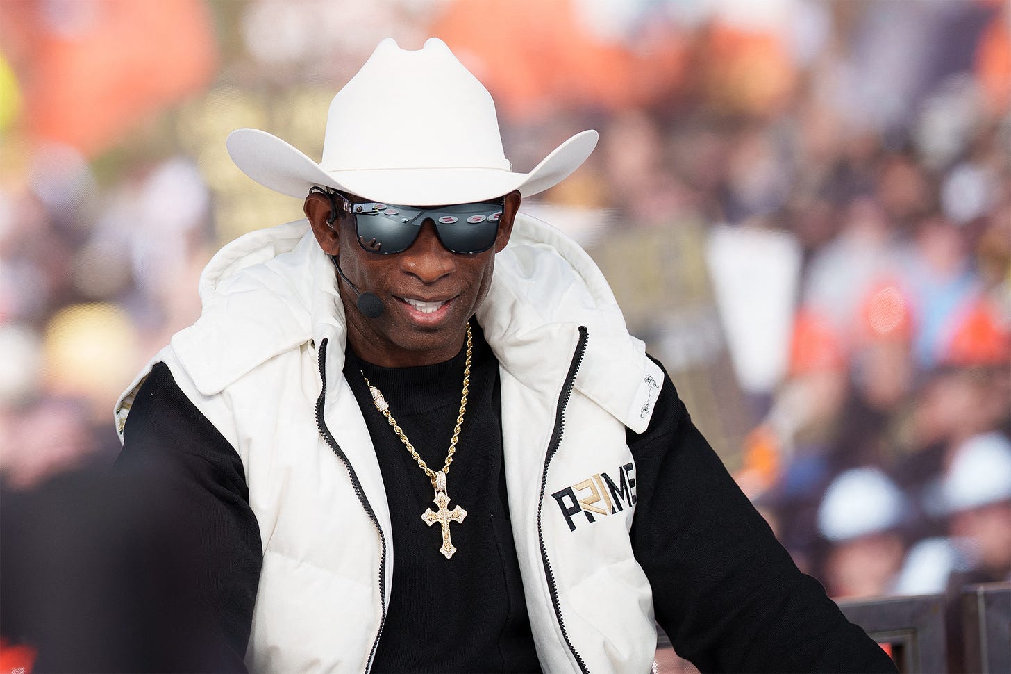 Deion Sanders shades Jay Norvell, hangs with The Rock pregame