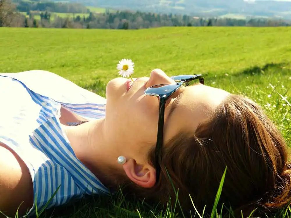 woman lying in a field