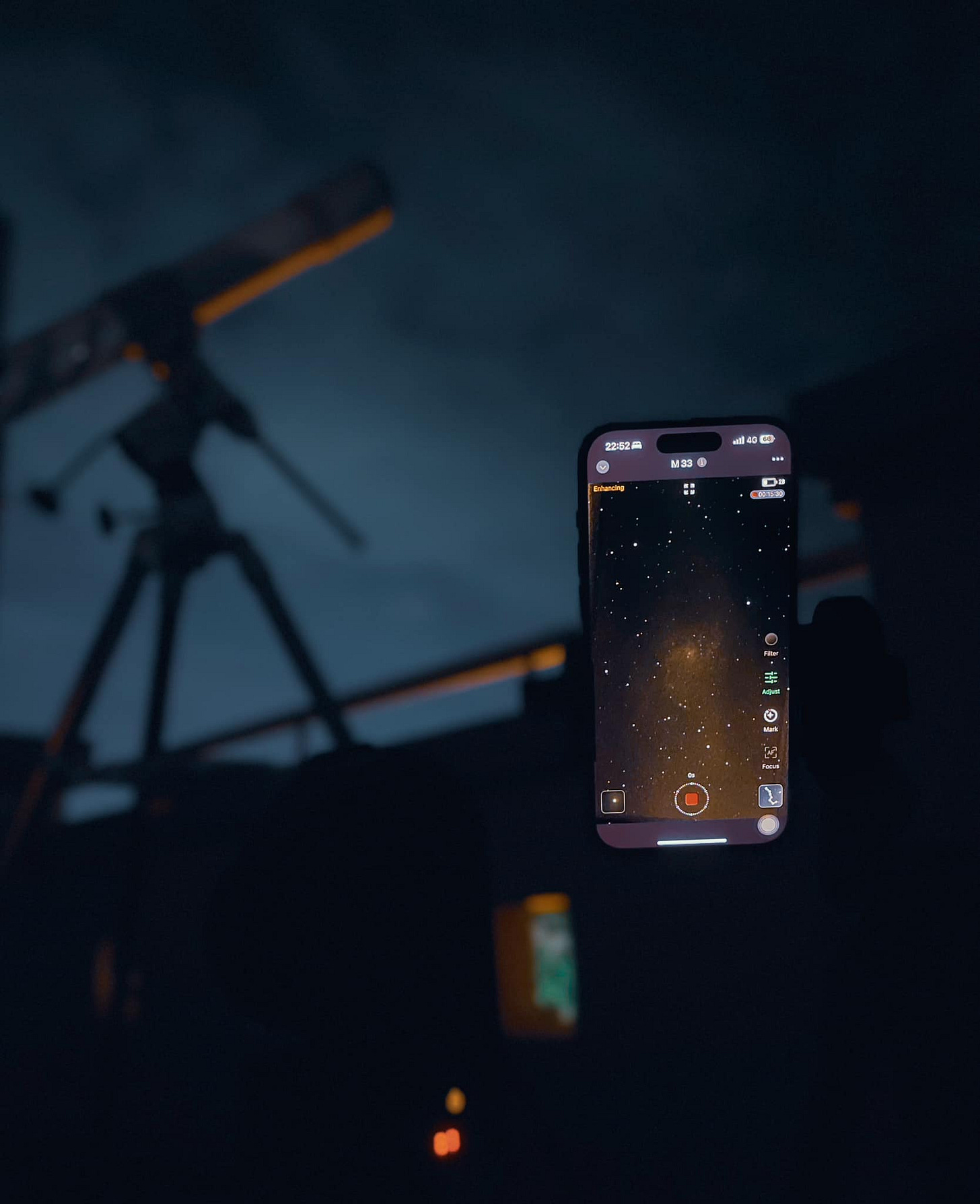 May be an image of phone, windmill and text
