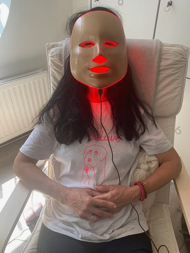 A person wearing a mask

Description automatically generated