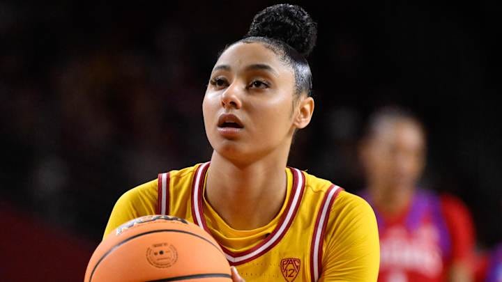 Mar 25, 2024; Los Angeles, CA, USA; USC Trojans guard JuJu Watkins (12) shoots a free-throw during an NCAA Women’s Tournament 2nd round game against the Kansas Jayhawks at Galen Center. Mandatory Credit: Robert Hanashiro-Imagn Images