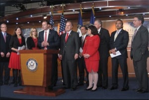 Arizona's Ann Kirkpatrick and Kyrsten Sinema (at left in matching black and red) are members of the United Solutions Caucus.