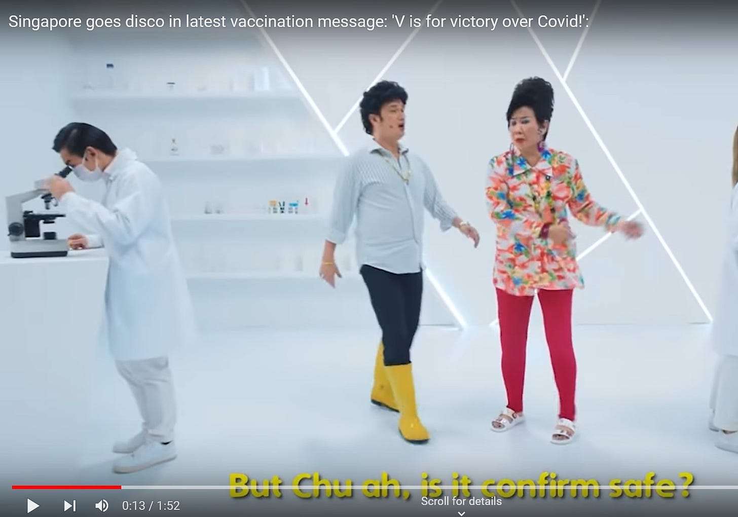 May be an image of 3 people, people standing and text that says "Singapore goes disco in latest vaccination message: is for victory over Covid!': � 0:13/1:52 1:52 But Chu ah, Scroll for details safe?"
