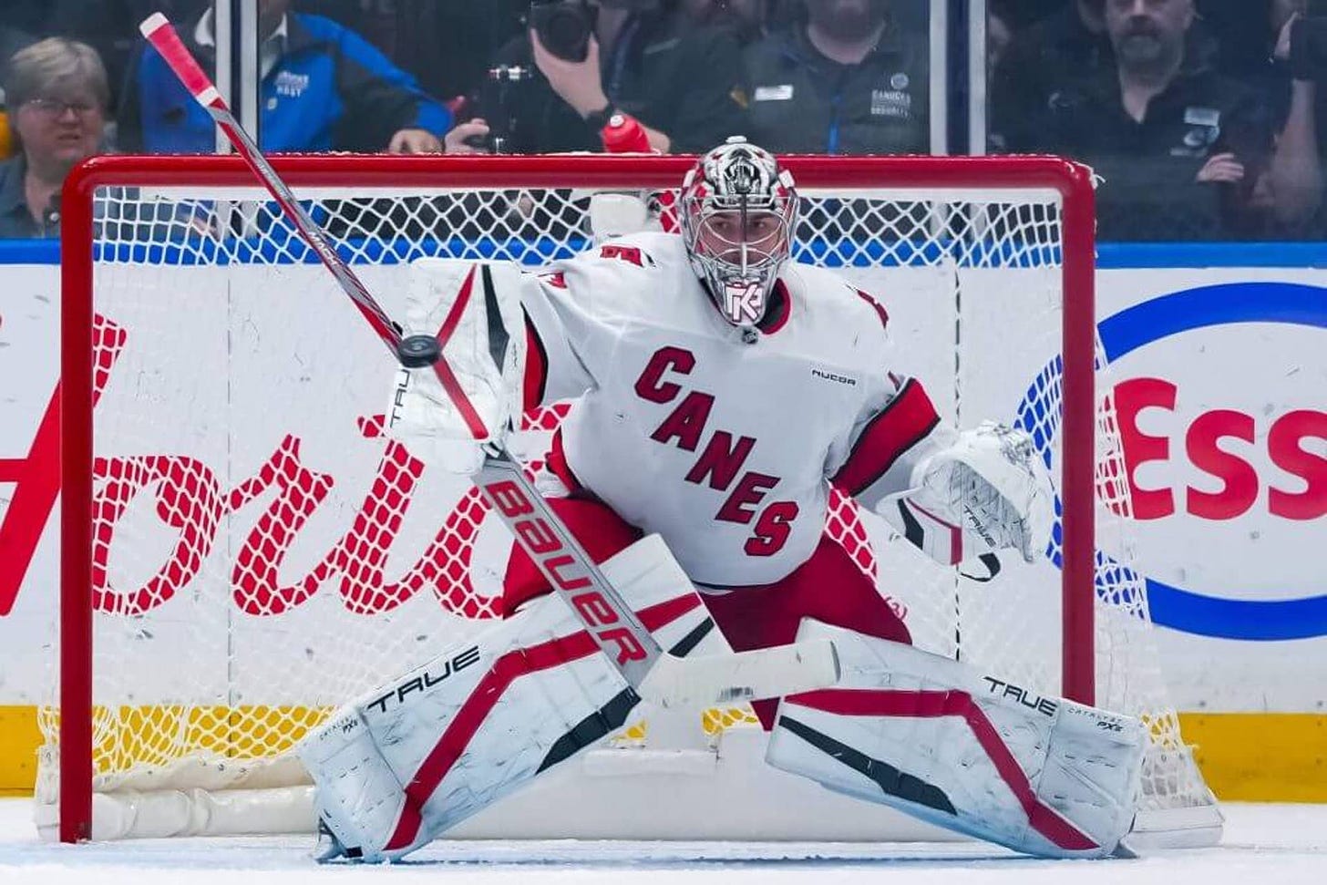 VANCOUVER, CANADA - OCTOBER 28: Pyotr Kochetkov #52 of the Carolina Hurricanes makes a save during the second period of their NHL game against the Vancouver Canucks at Rogers Arena on October 28, 2024 in Vancouver, British Columbia, Canada. (Photo by Derek Cain/Getty Images)