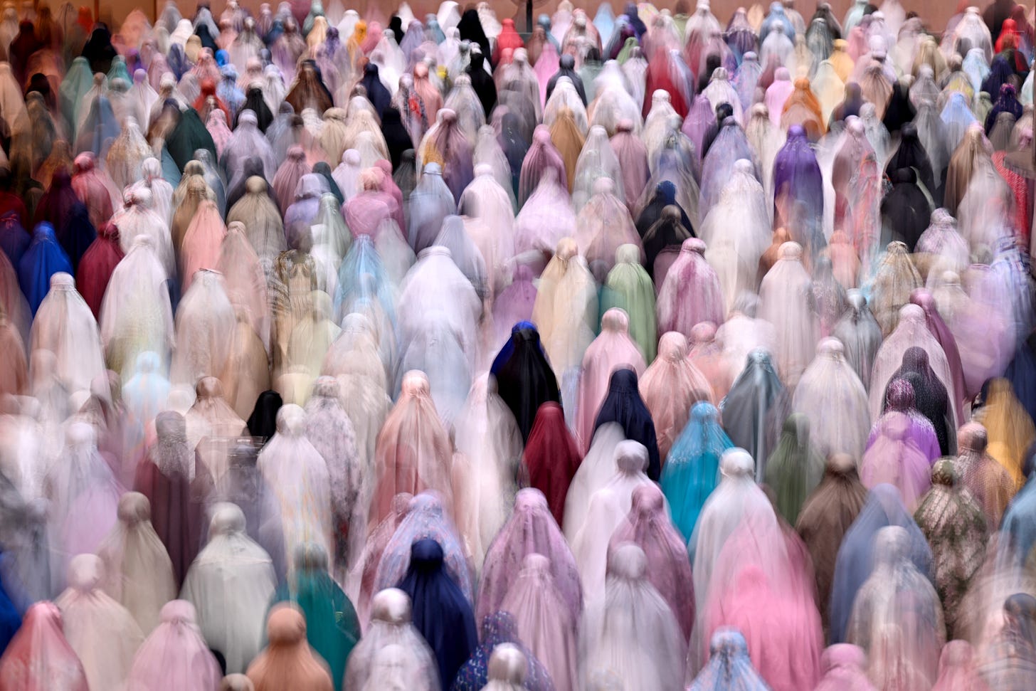 Muslim devotees offer night prayers marking the start of Islam's holy fasting month of Ramadan at Istiqlal mosque in Jakarta on March 11, 2024. (Photo by Adek Berry/AFP via Getty Images)