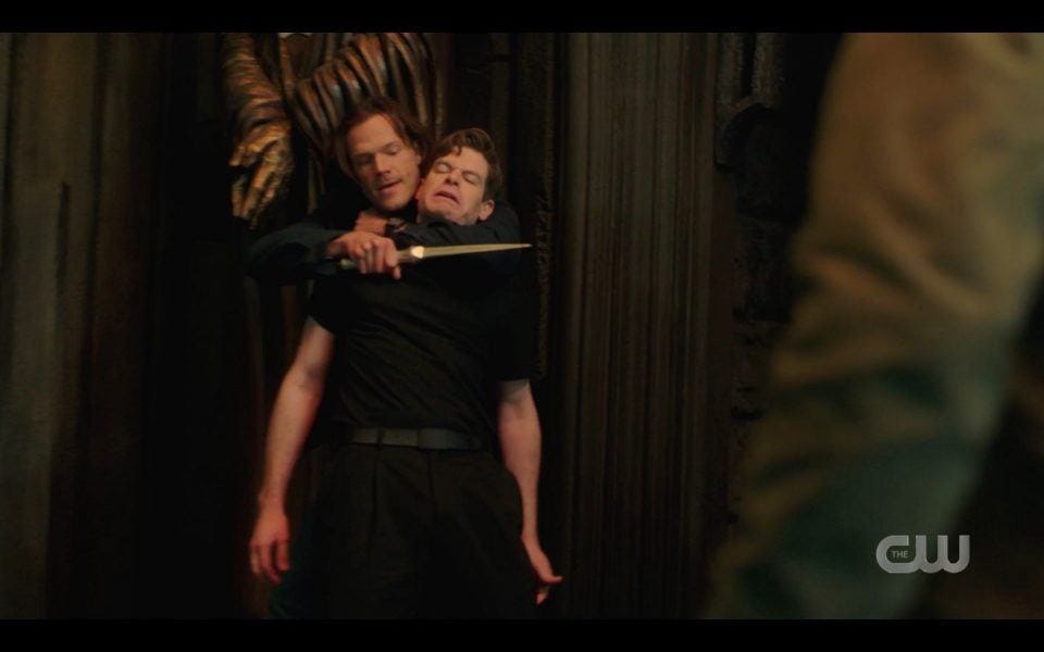 Sam Winchester with knife to mans throat the bitch set us up