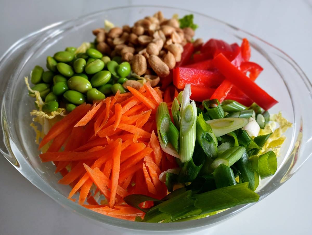 asian cabbage salad ingredients in bowl