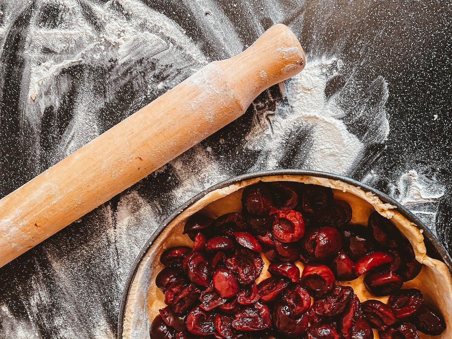 Cook's workspace - cherry pie, rolling pin