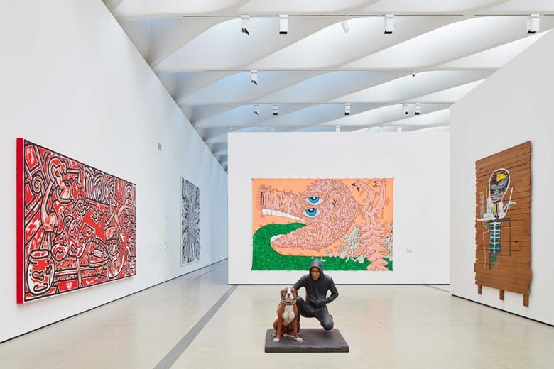 In foreground John Ahearn, Raymond and Toby, 1989; From left, Keith Haring, Red Room, 1988; Keith Haring, Untitled, 1984; Jean-Michel Basquiat, Gold Griot, 1984. © John Ahern. Keith Haring artworks © Keith Haring Foundation © The Estate of Jean-Michel Basquiat  ADAGP, Paris  ARS, New York 2016