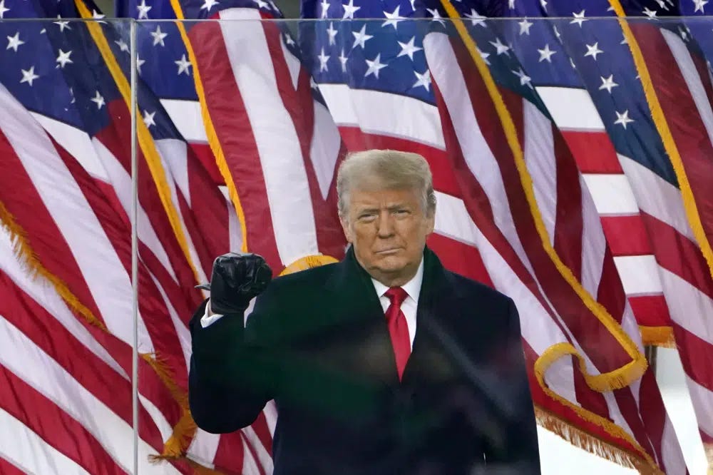 President Donald Trump gestures as he arrives to speak at a rally on Jan. 6, 2021, in Washington. Facebook parent Meta is reinstating former President Donald Trump's personal account after two-year suspension following the Jan. 6 insurrection. (AP Photo/Jacquelyn Martin, File)