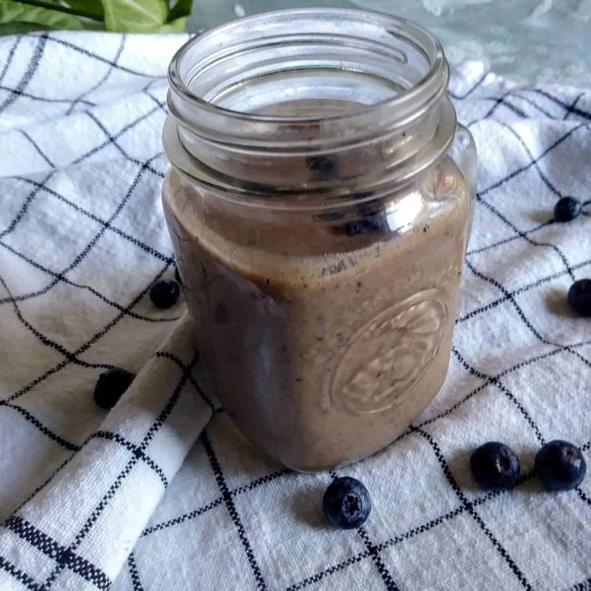 blueberry almond smoothie in mason jar.