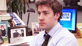 Jim from the office with an expressionless face, shaking his head